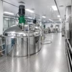 Stainless steel vacuum mixing tank system in cleanroom production area